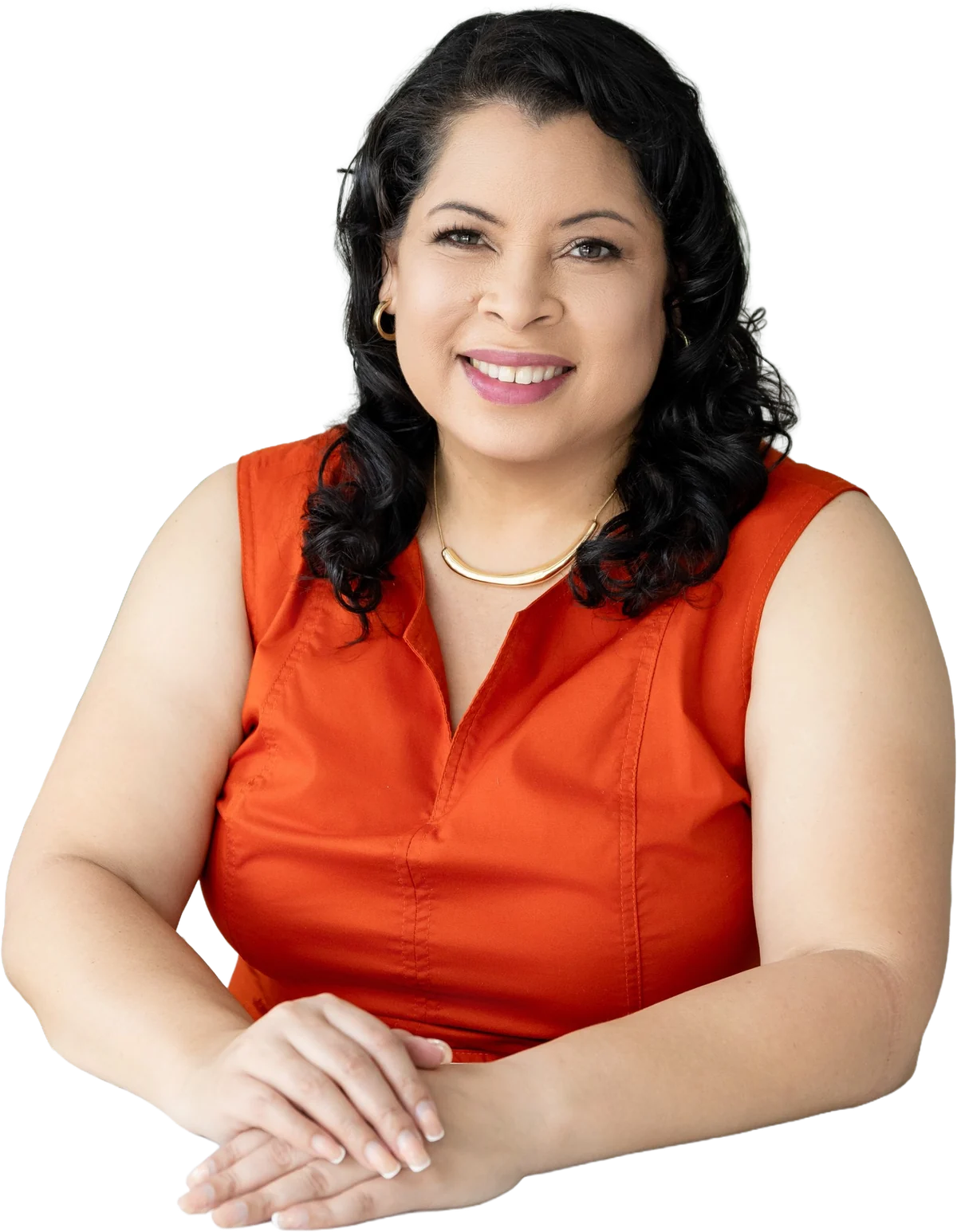 Ruthann Fong smiling, arms resting in front of her.